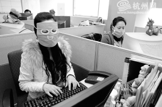 Illustration for article titled China's Radiation Masks Sure Make Computer Work Interesting
